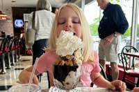 Just another ice cream smile behind the whipped cream